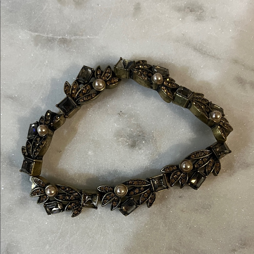 Vintage-Inspired Gold and Silver Bracelet with Pearl Details